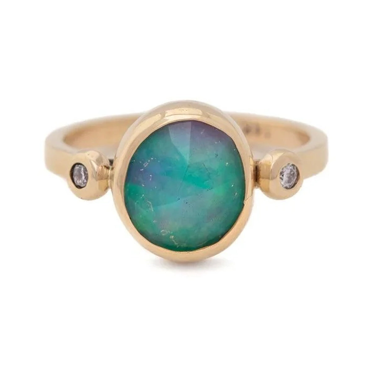 Annie custom oval opal ring in gold with two small side stones, front view