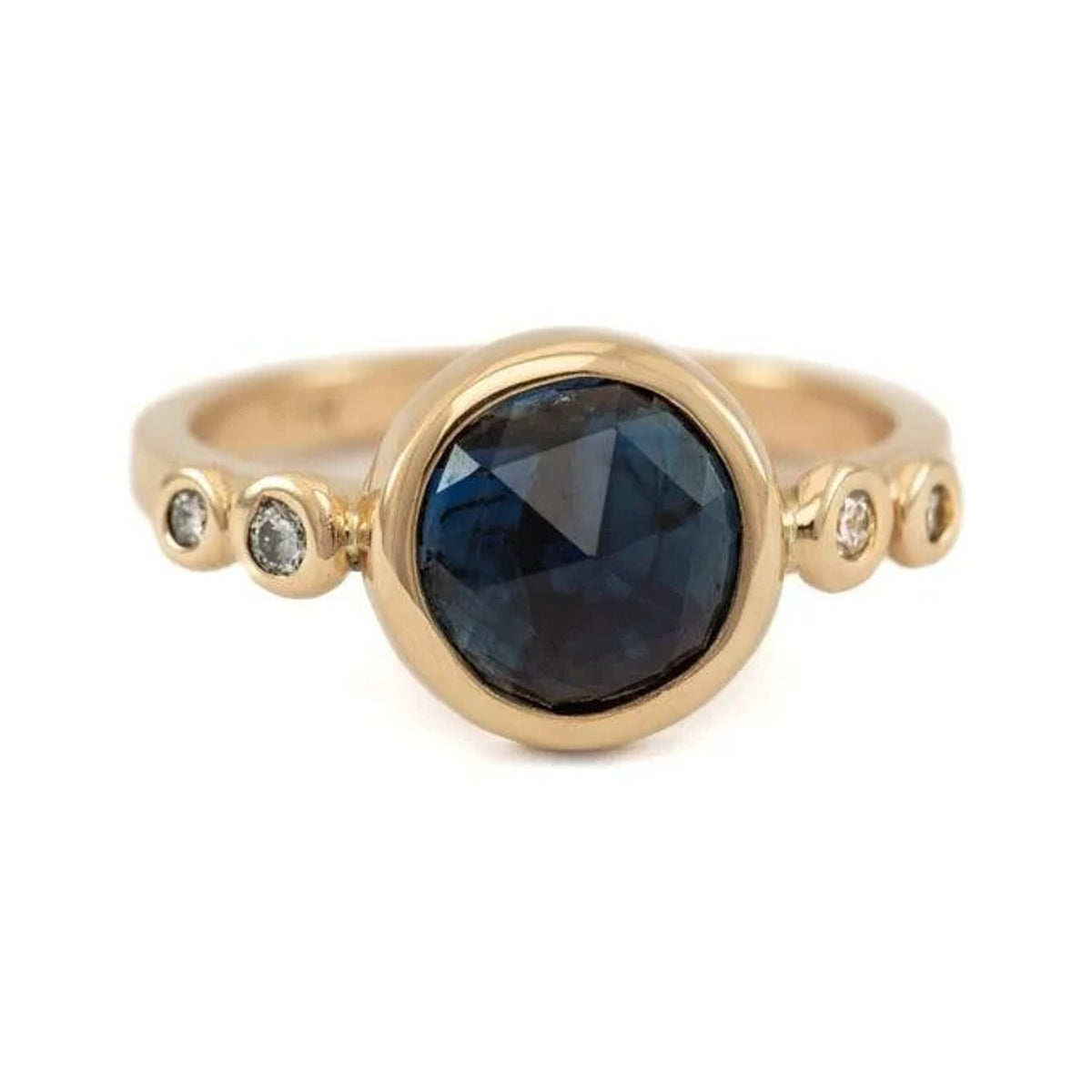 Aubrey custom ring with a round rose cut blue sapphire and four small side stones in gold