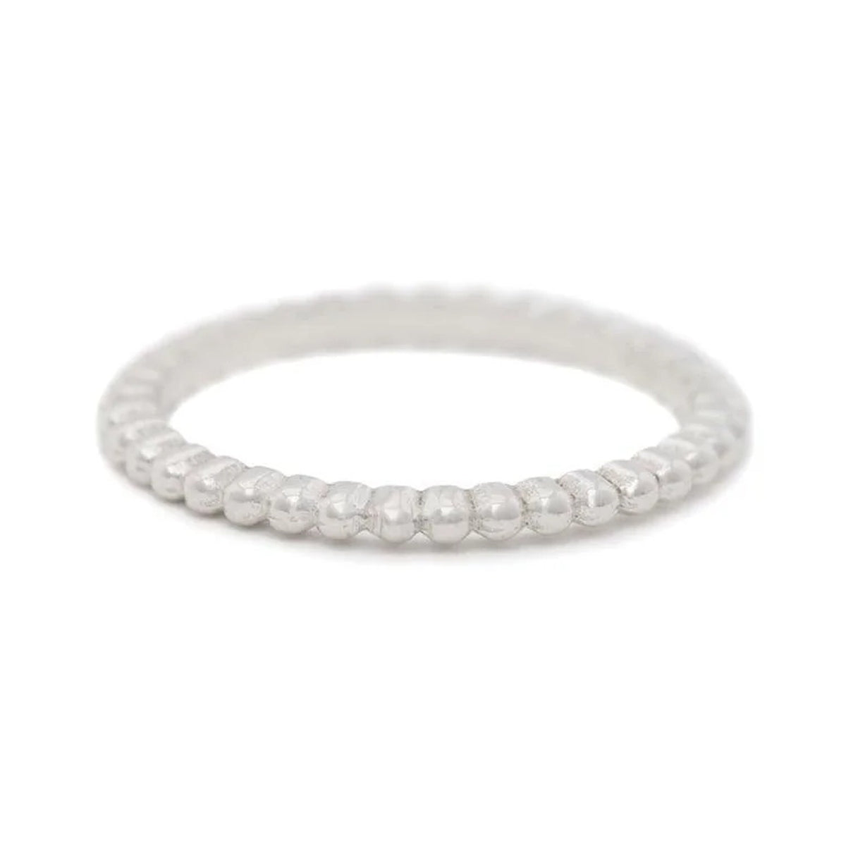 Beaded ring in sterling silver, a fine stacking band of round beads, front view