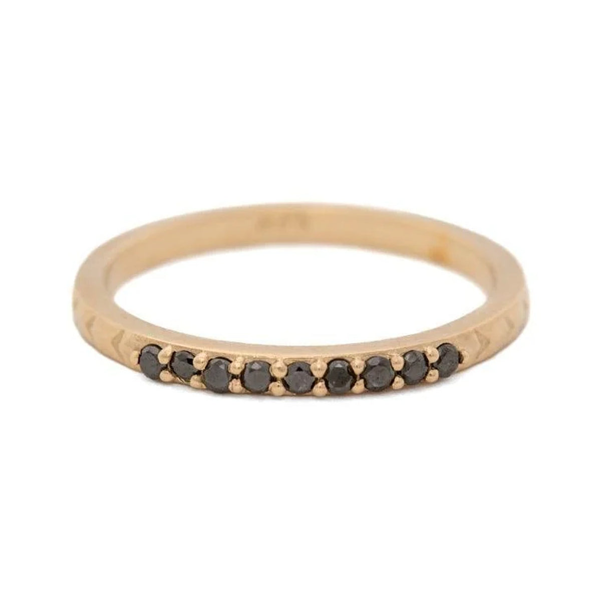 Black diamond band in 14k yellow gold set with a row of round black diamonds, front view