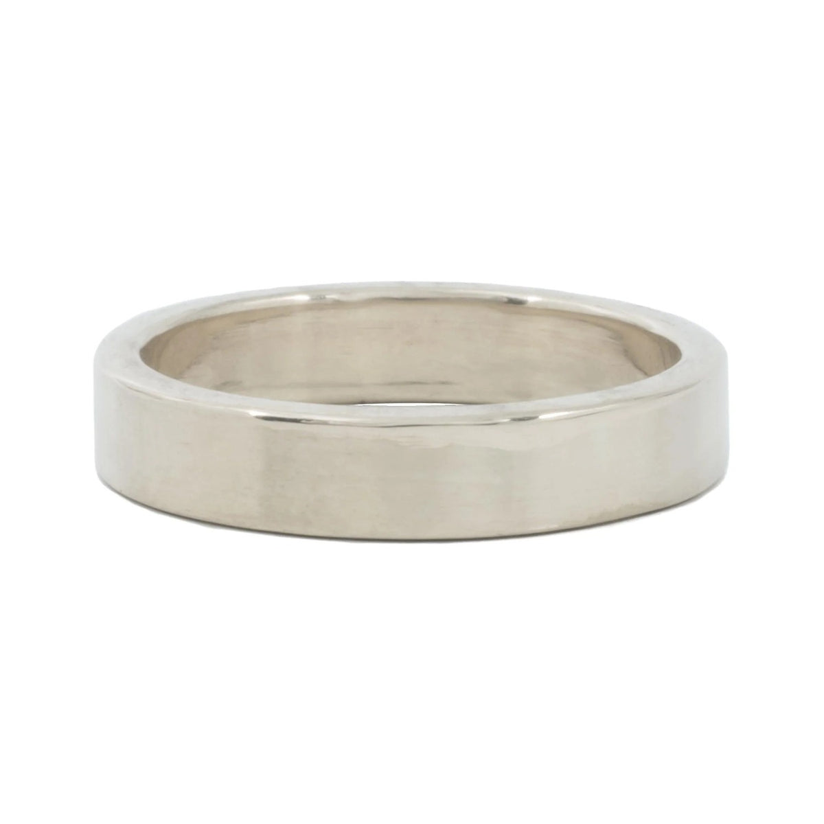 Classic 4mm sterling silver wedding band with high polish finish, front view