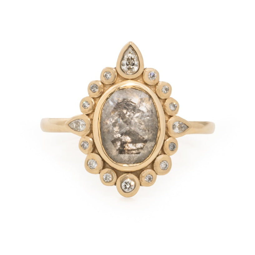 Oval central salt and pepper diamond ring, 16 accent diamonds.