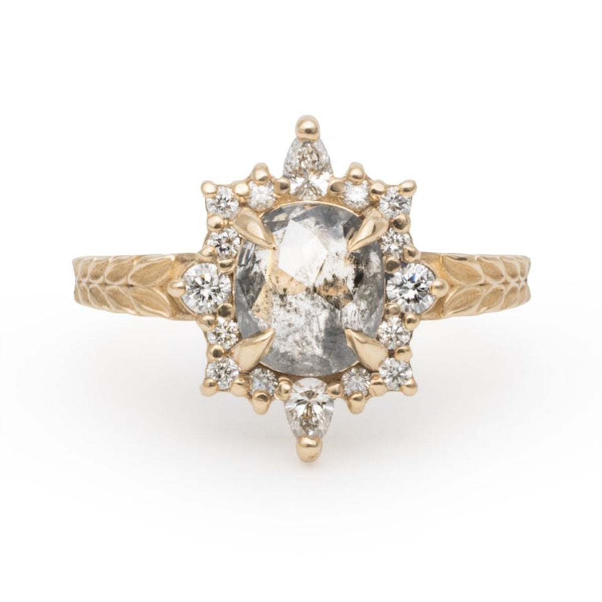 Elsa oval salt and pepper diamond ring in 14k gold with a starburst diamond halo, front view