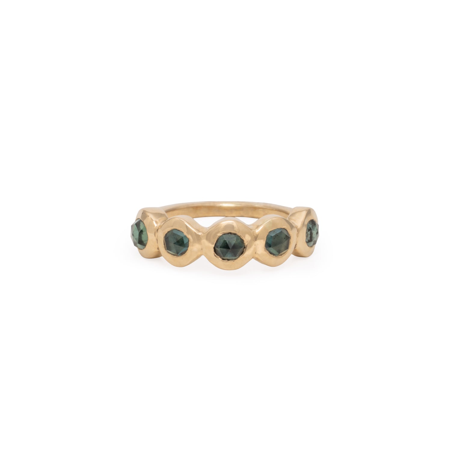 Gold ring with green gemstones on a white background