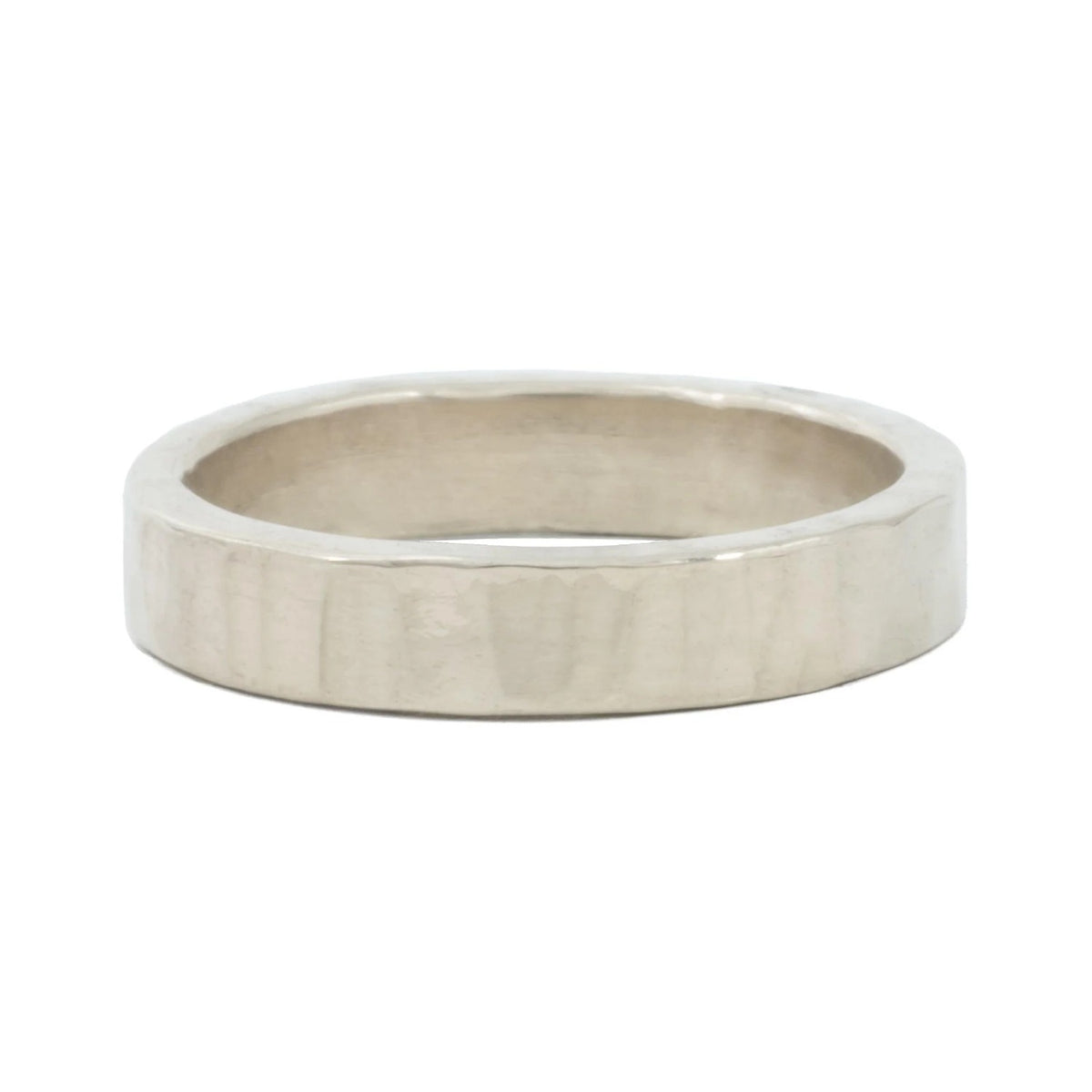 Hammered 4mm sterling silver wedding band with hammered texture, front view