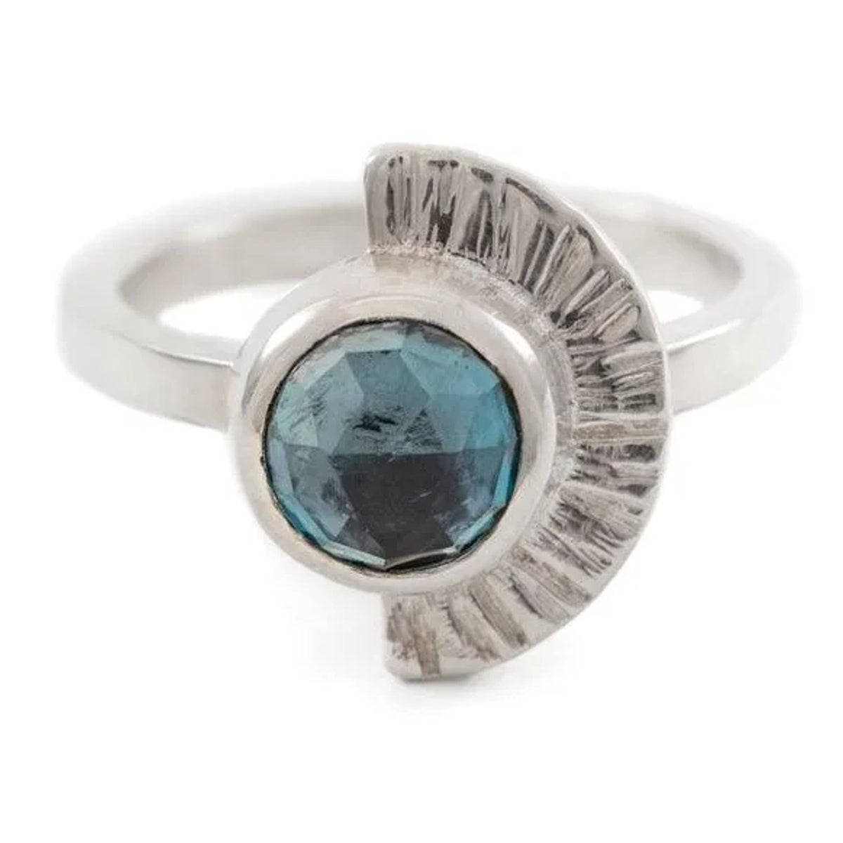 Hathor Ring in sterling silver with London blue topaz and a textured half sunburst, close-up