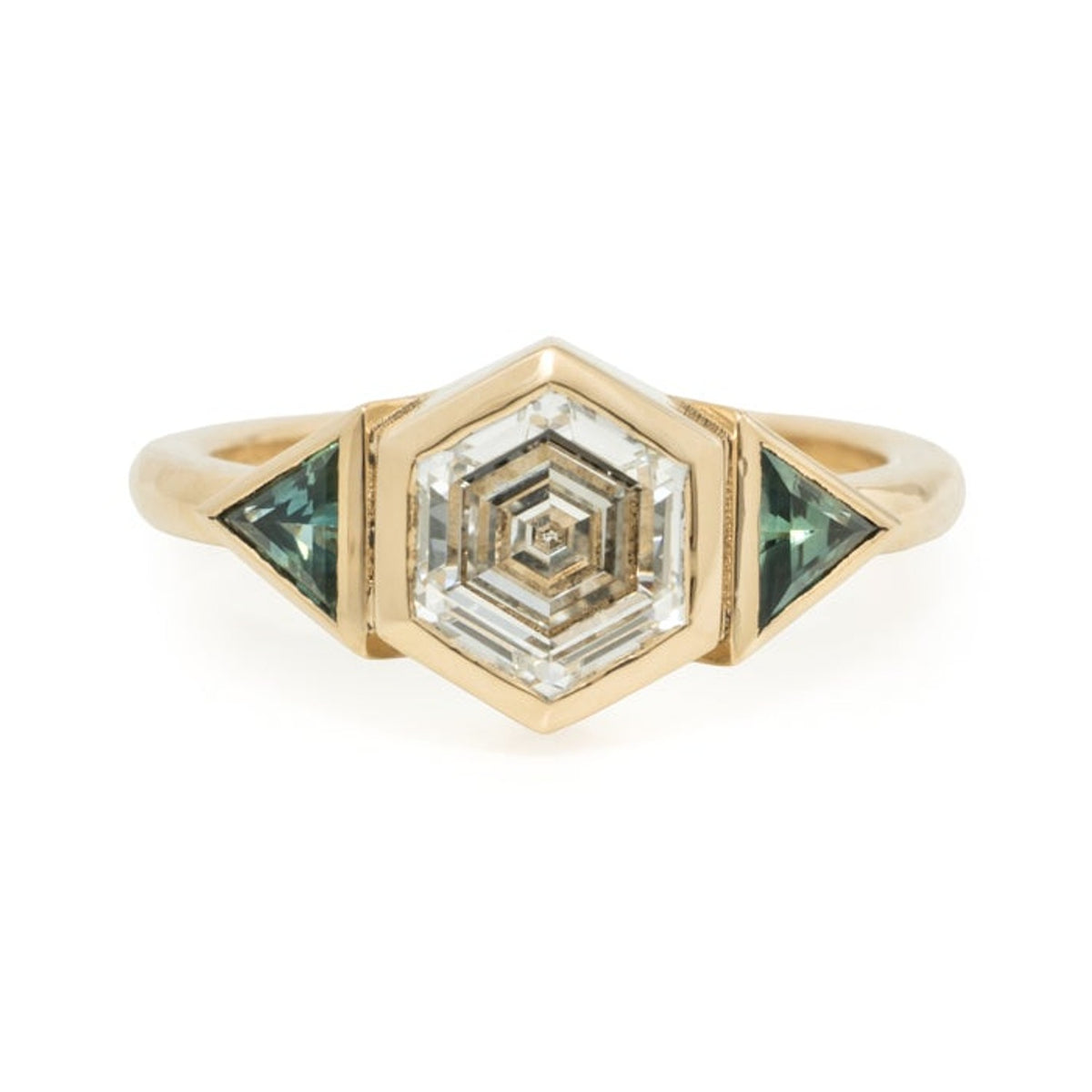 Dana ring with a hexagon diamond and two triangle sapphires in gold bezels, front view