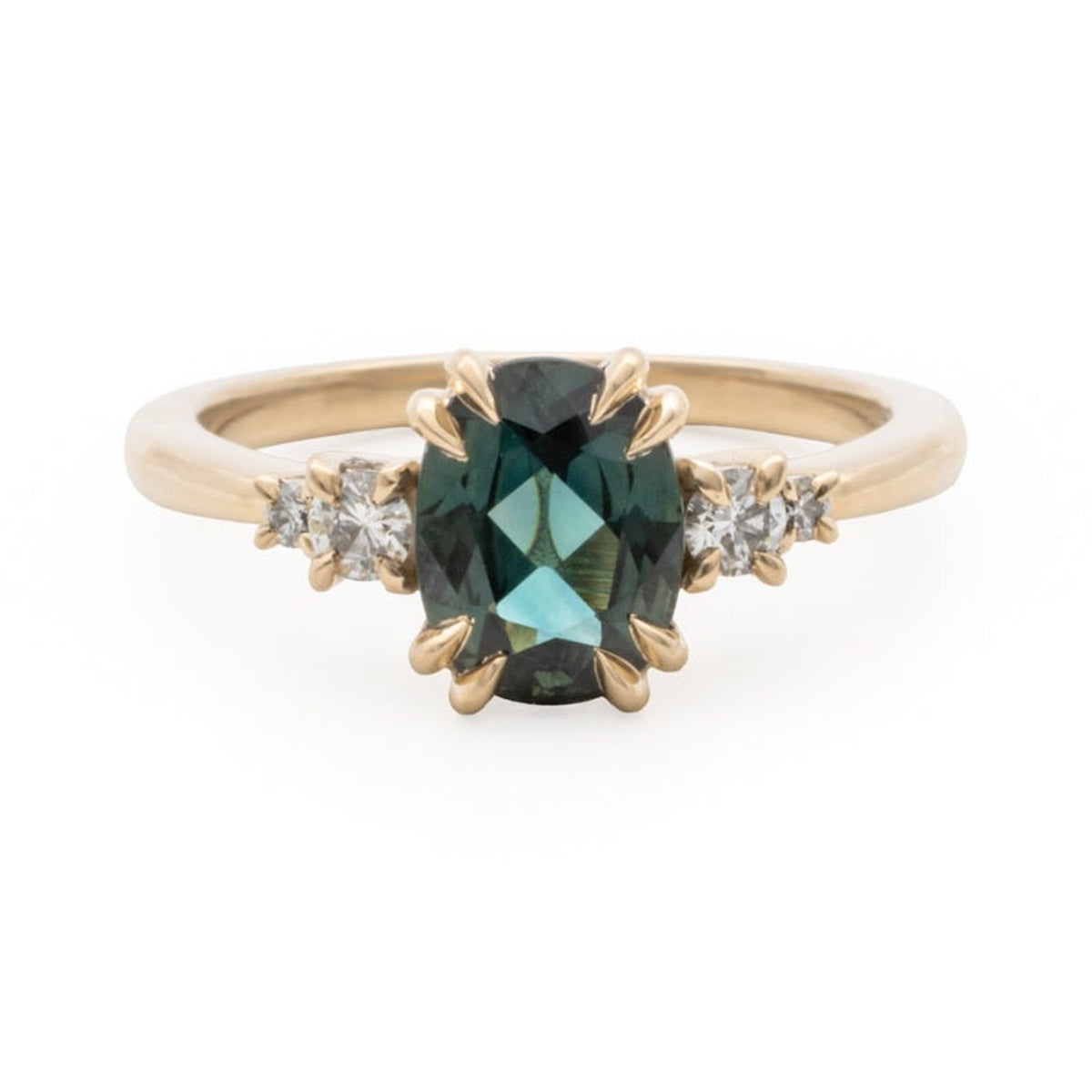 Kat Cadegan custom ring with sapphire and diamonds in 14k with prong setting.