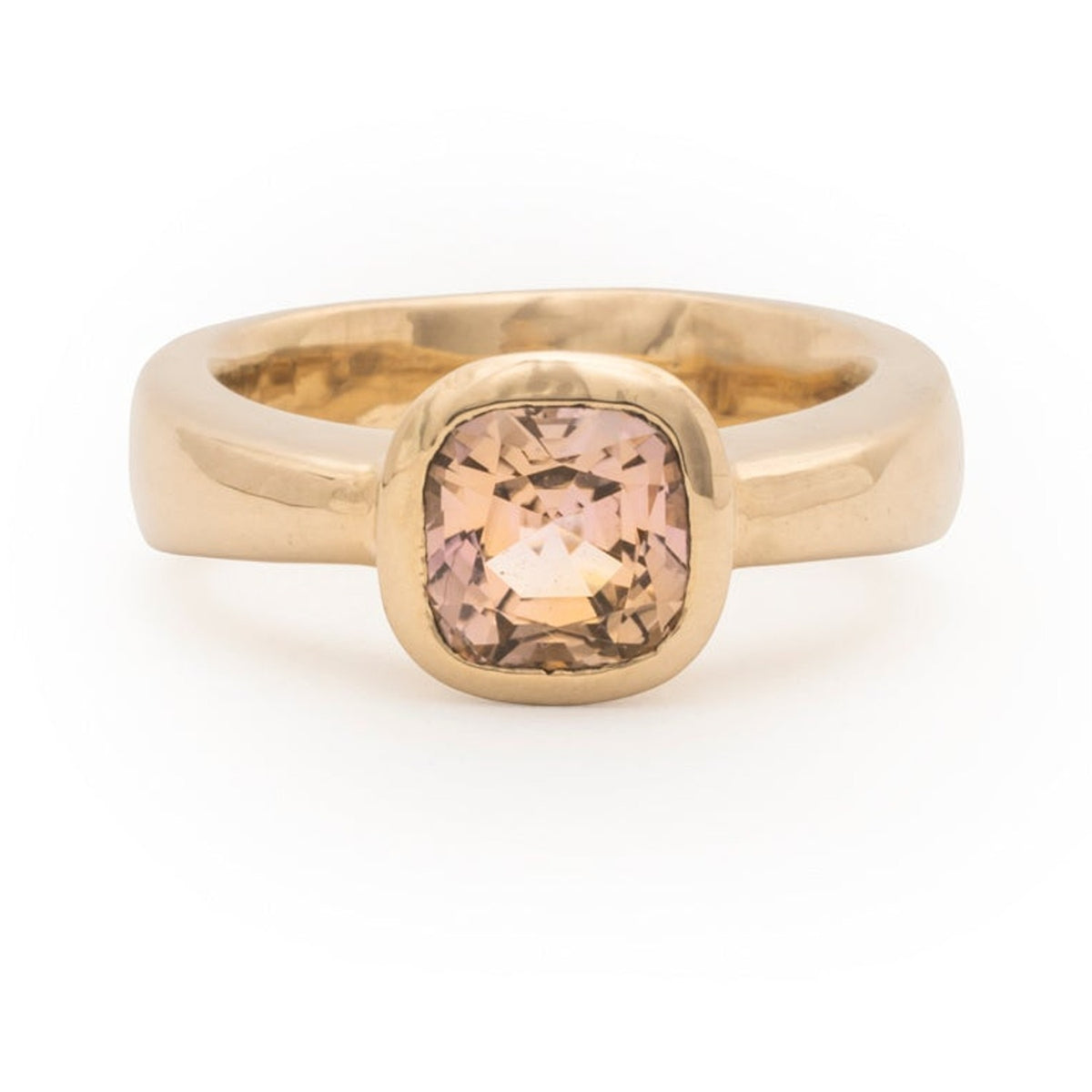 Georgia ring with a 2.1ct cushion peach tourmaline bezel set in 14k gold, front view
