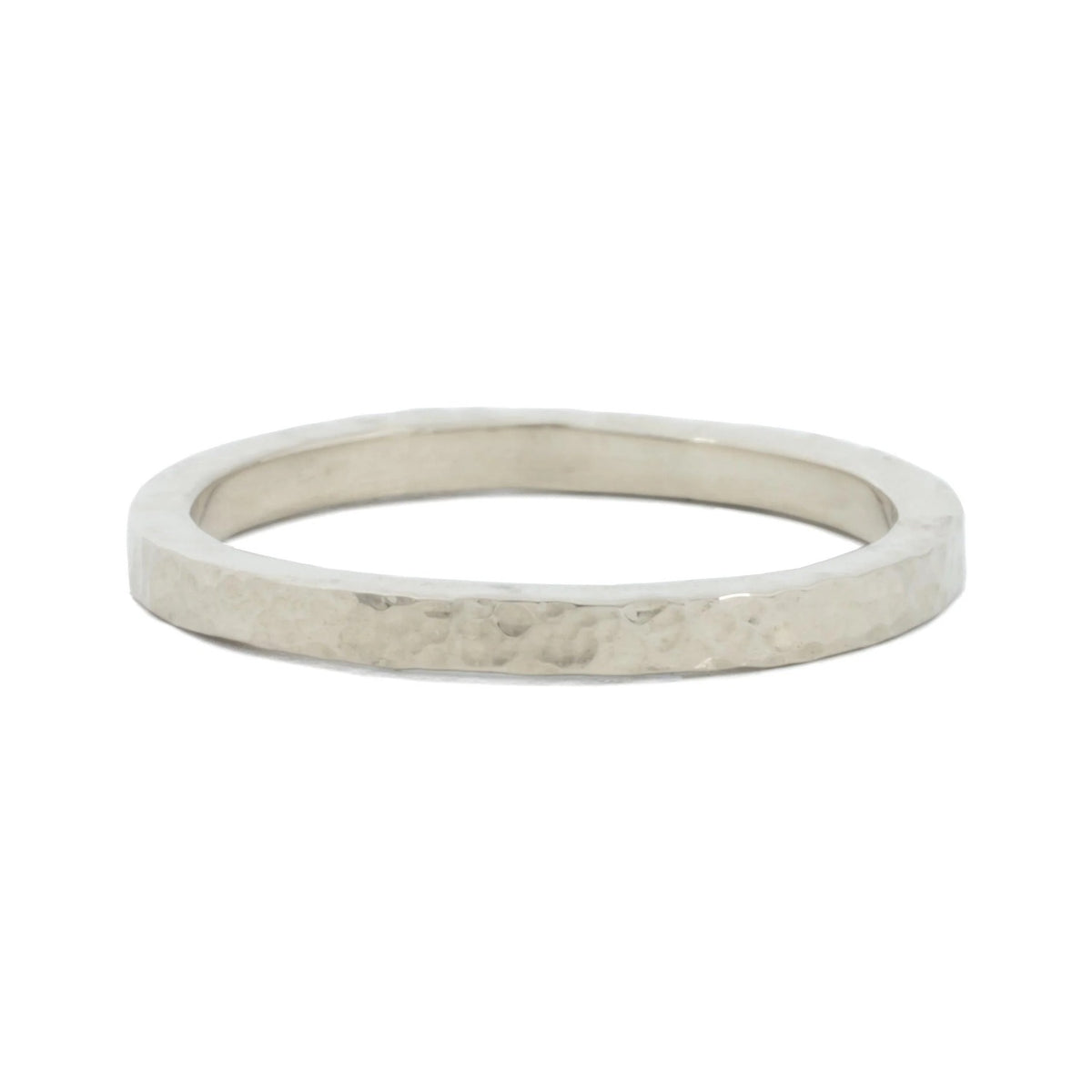 Pebble 2mm textured wedding band in sterling silver, side view