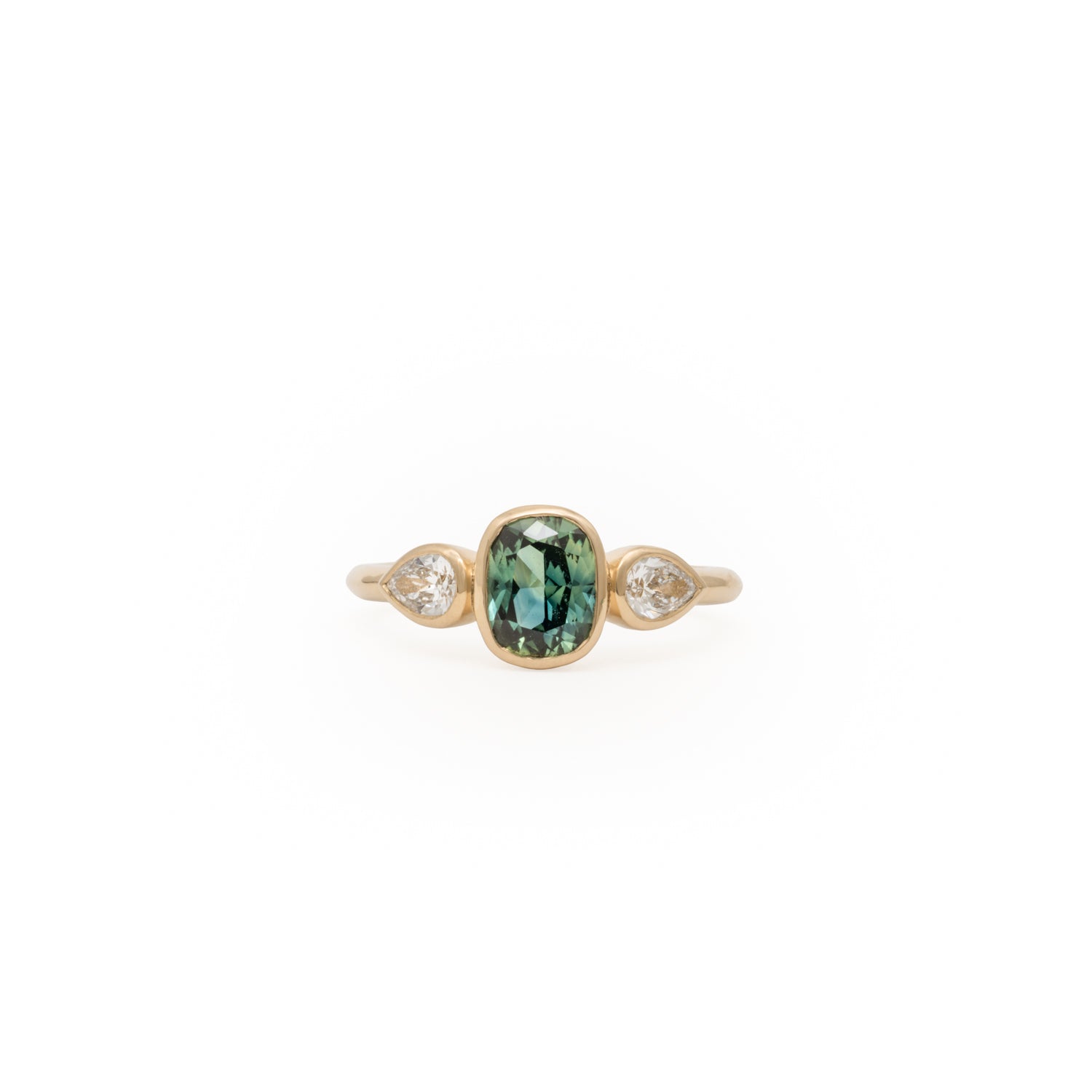 Kat Cadegan custom piece with sapphire and pear diamond in bezel setting, 14k gold