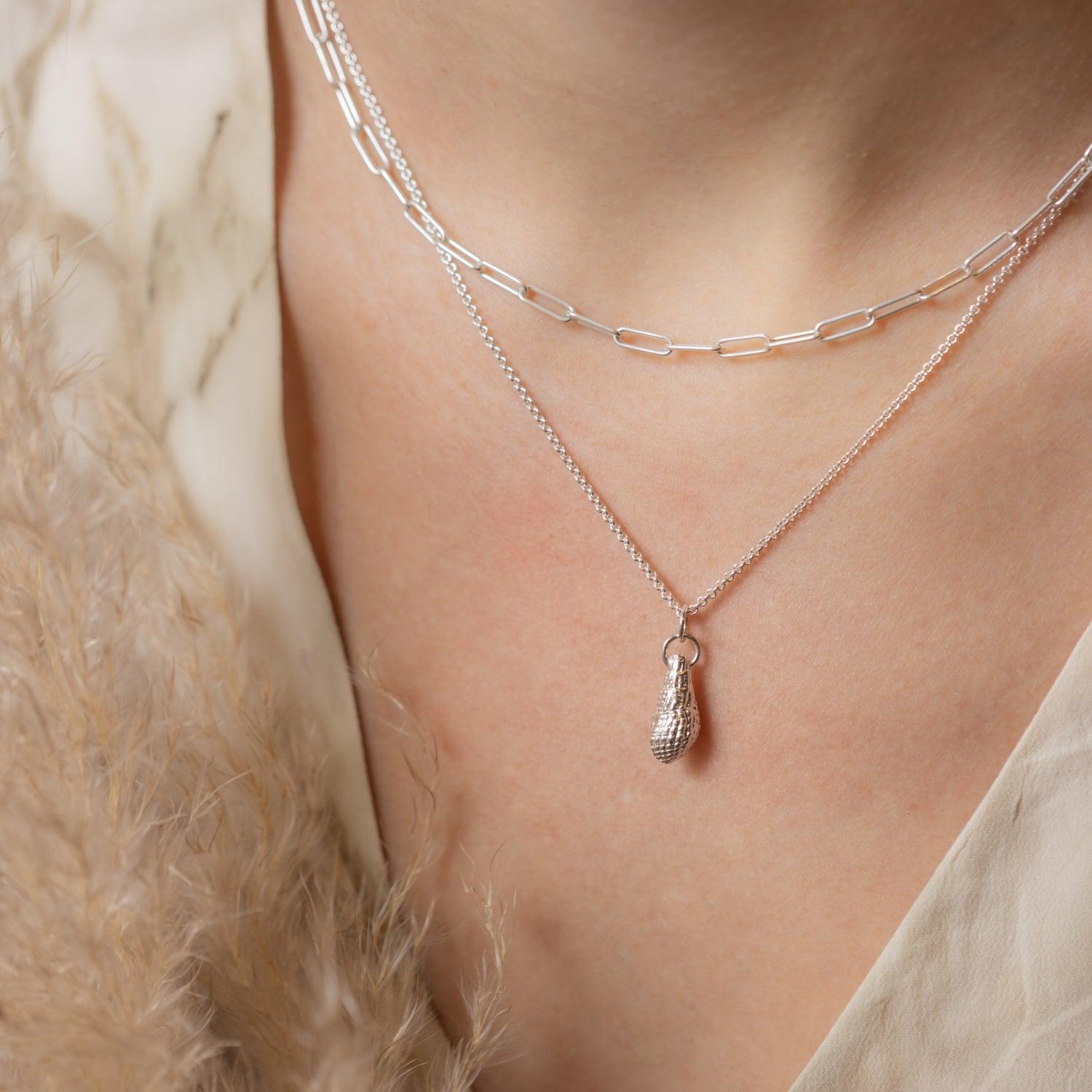 Seashell Pendant - Kat Cadegan