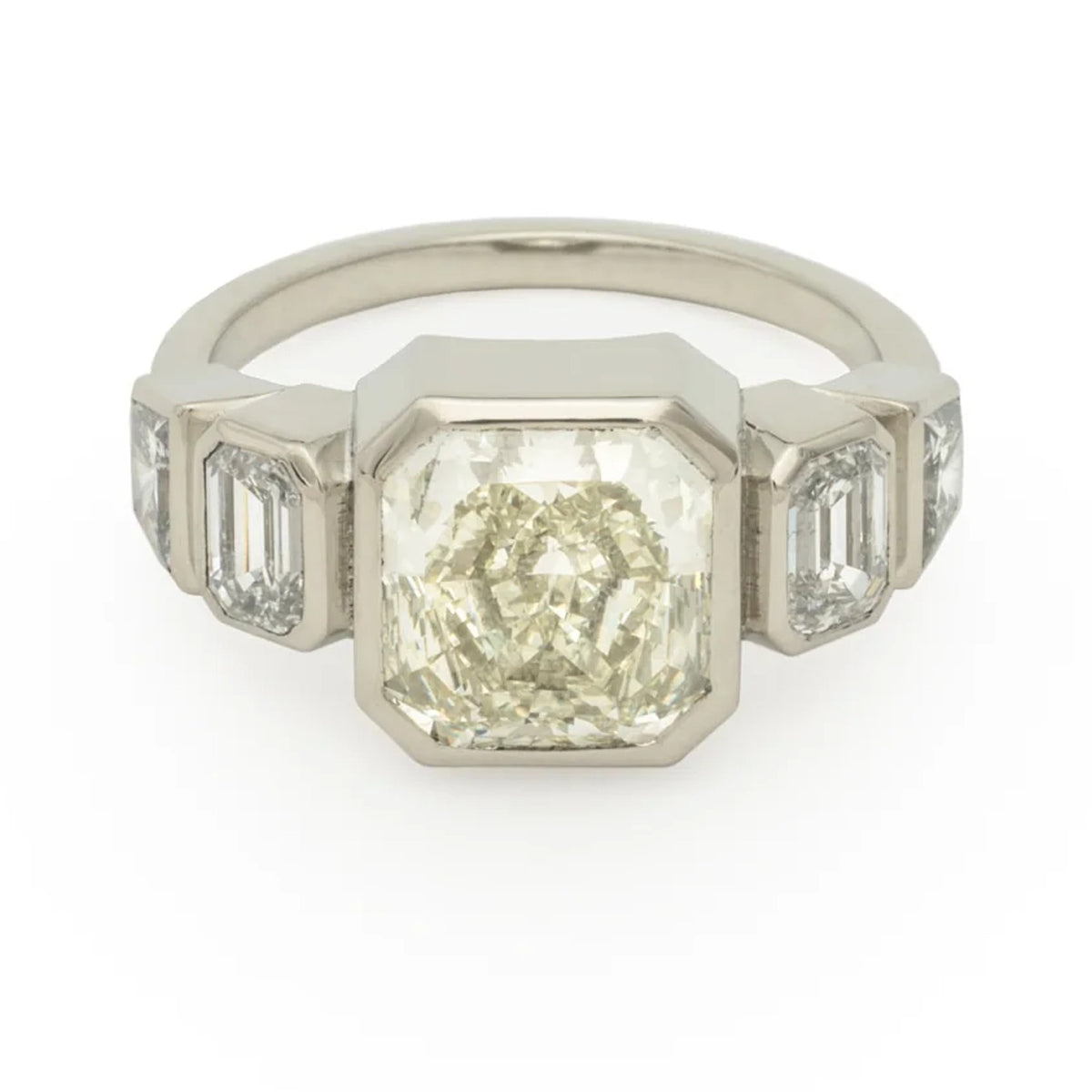 Kat Cadegan Custom White Gold diamond ring with 5 diamonds