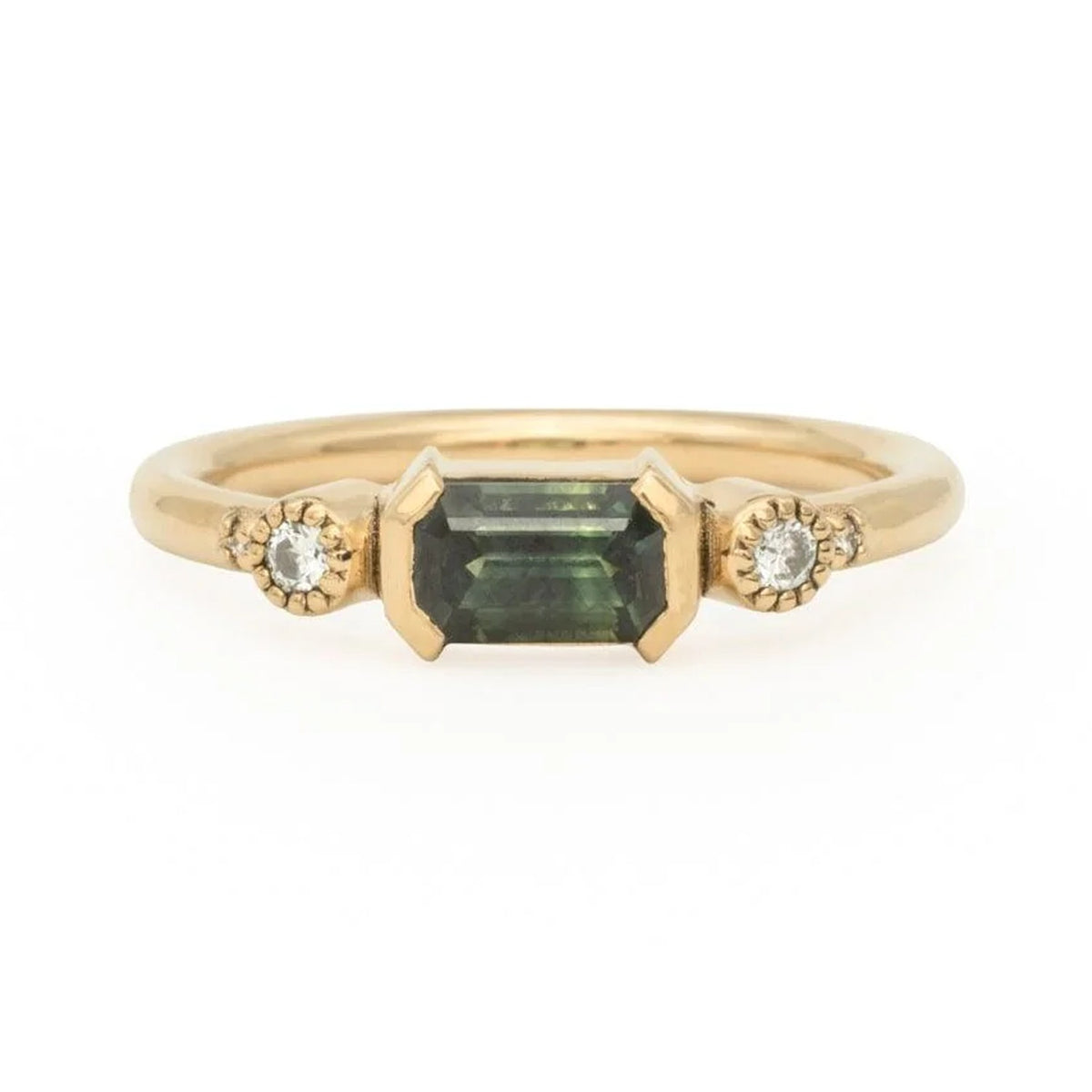 Tula green baguette sapphire ring in 14k gold with a round diamond on each side, front view