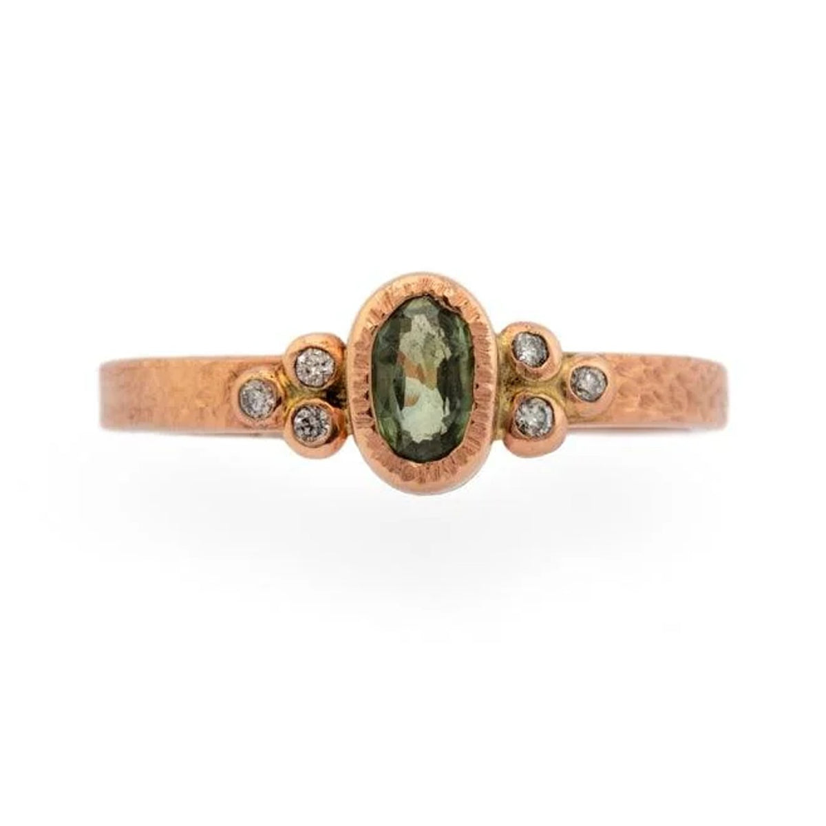 Maeve oval green sapphire ring with clusters of small diamond accents on a textured band, front view