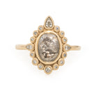 Oval central salt and pepper diamond ring, 16 accent diamonds.