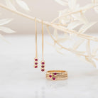 Earrings and Stacking Ruby Rings - Kat Cadegan