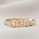 14k gold ring with 5 round diamonds 