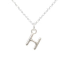 Silver necklace with a letter 'H' pendant on a white background