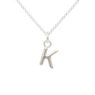 Silver necklace with a 'K' pendant on a white background