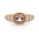 Rwanda Asscher cut pink tourmaline ring in 14k gold with baguette and round diamonds, front view