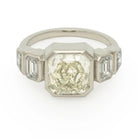 Kat Cadegan Custom White Gold diamond ring with 5 diamonds