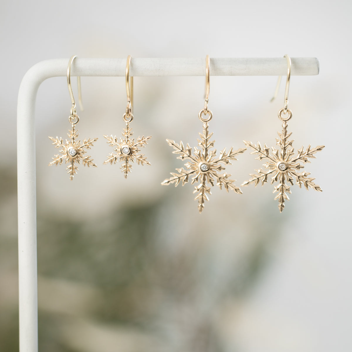 Kat Cadegan 2025 Snowflake earrings large and small with diamond in 14k gold