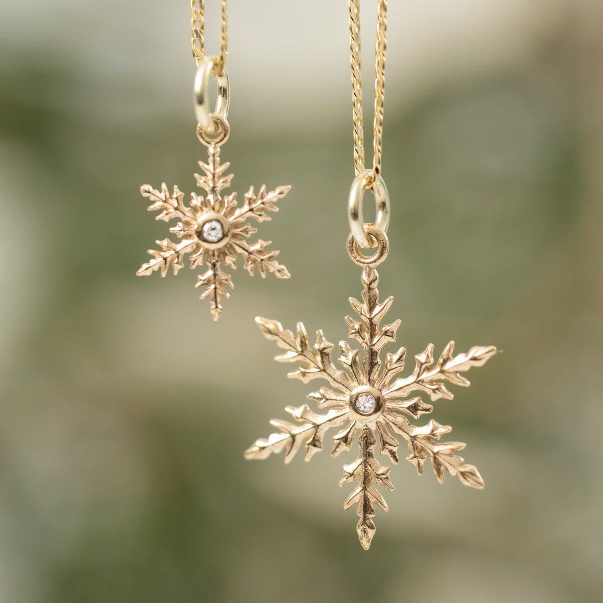 Kat Cadegan 2025 Snowflake 14k gold pendant with diamond on chain large and small