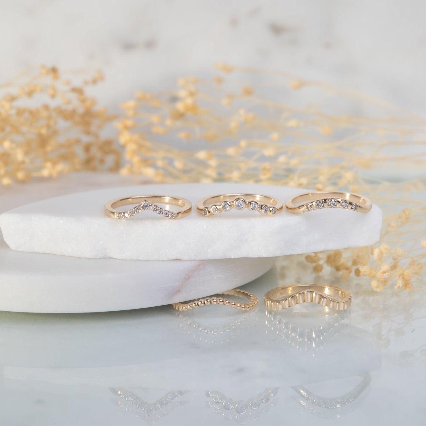 Starburst halo with 5 diamonds - Kat Cadegan