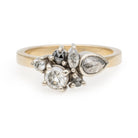 Susan custom cluster ring with white and grey pear, marquise and round stones on a yellow gold band, front view